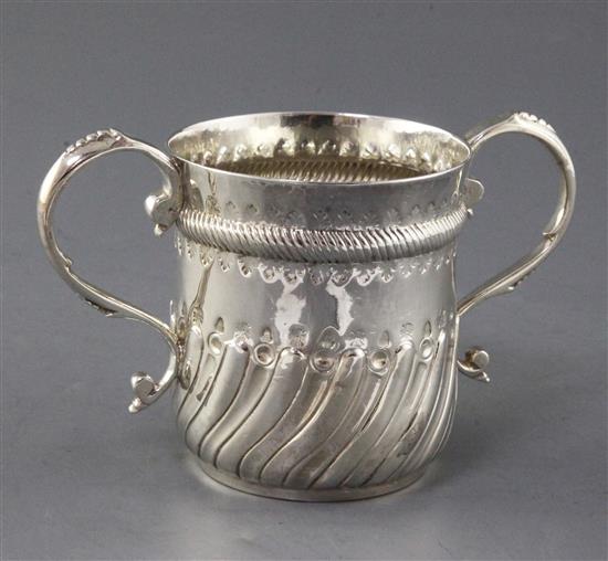 A George II repousse silver porringer, 6.5 oz.